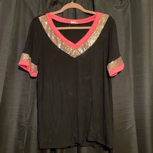 Black, pink, and gold tshirt